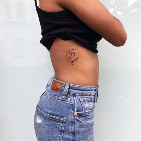 stomach tattoos for females|simple stomach tattoos.